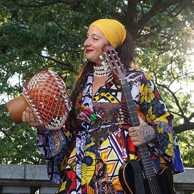 Remmi Nicole, vocalist and percussionist with DafinaRoots Band