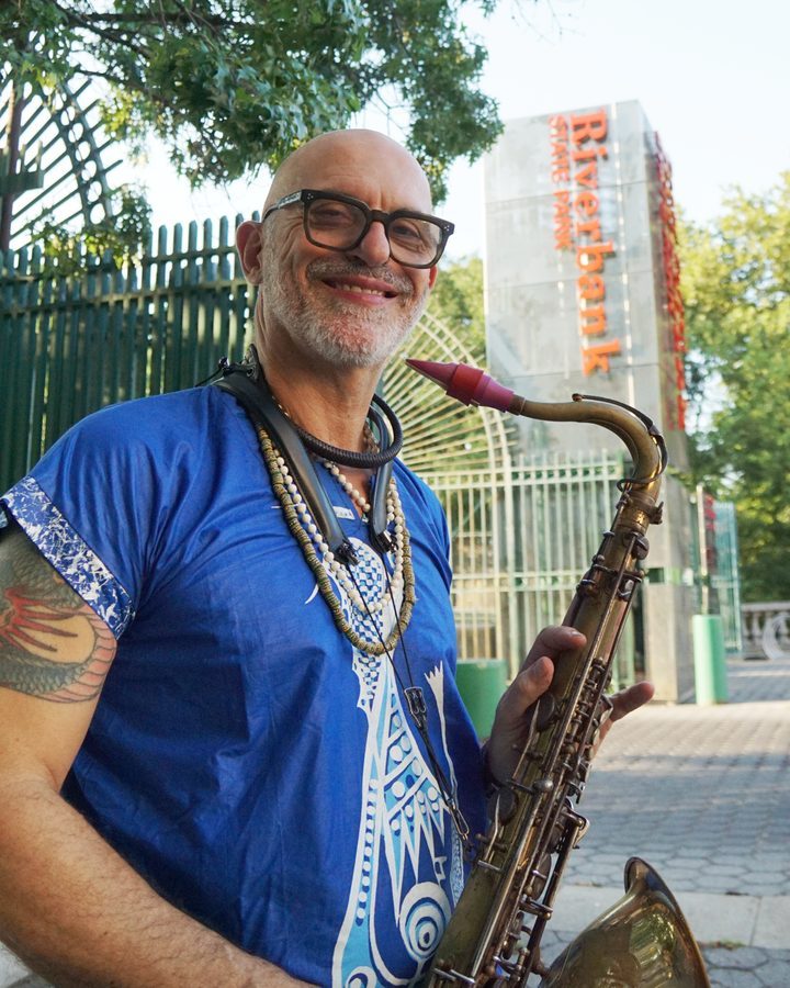 Marco Chelo playing saxophone with DafinaRoots Band